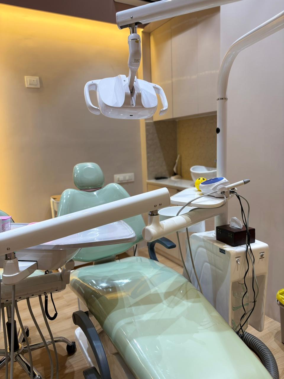 Dental operatory with overhead light at La Pearl dental clinic, CBD Belapur, Navi Mumbai