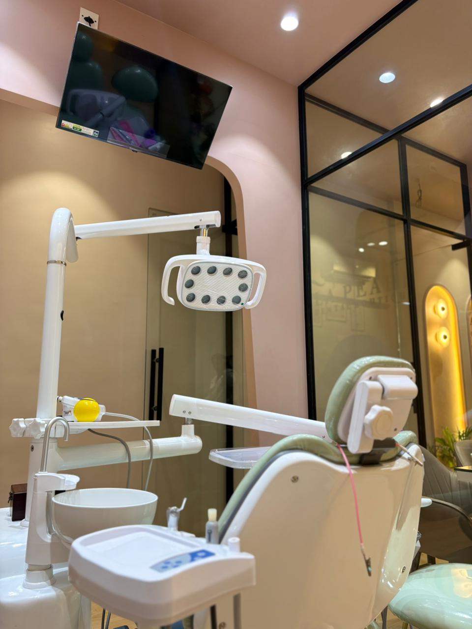 Root canal treatment room with glass partition at La Pearl, Navi Mumbai