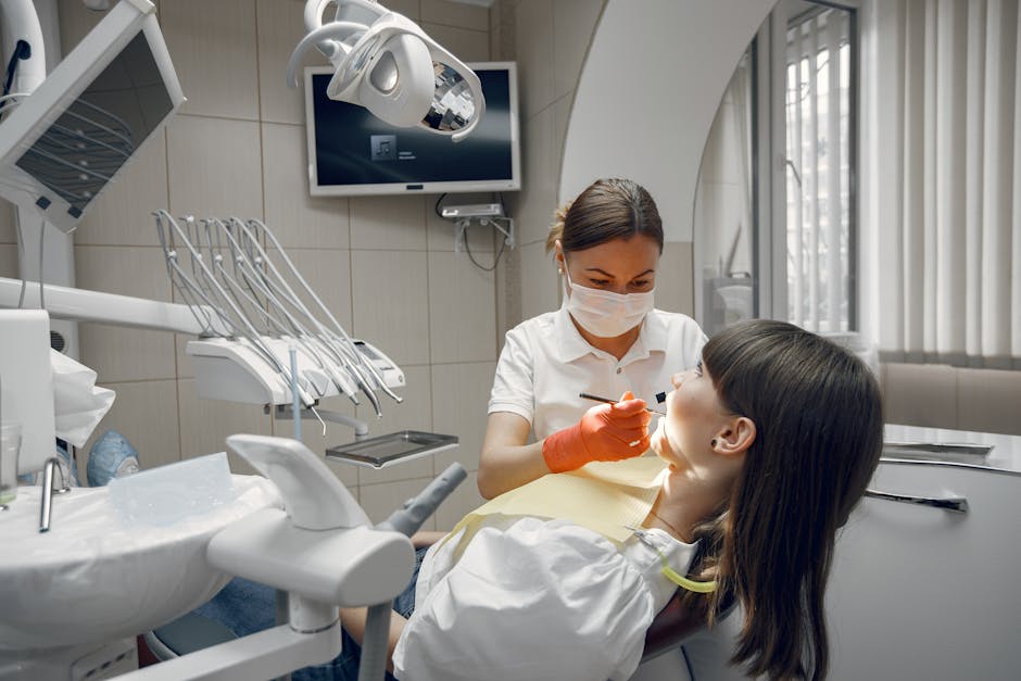 Dentist performing a painless root canal treatment on a patient